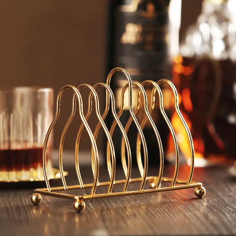 Six golden metal cocktail coasters with classical design from đđ đđđ đčđđđđ đ»đđđđ ïżœ