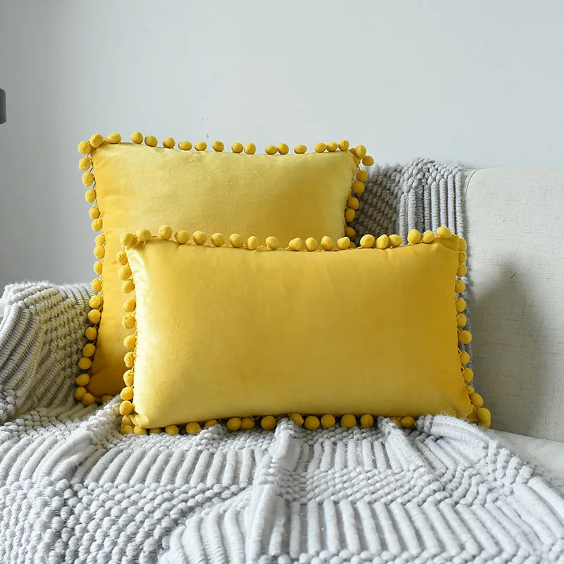 Soft velvet throw pillow cover by MC THE BLACK DIAMOND featuring a solid plain design with pom-pom accents for cozy home decor.