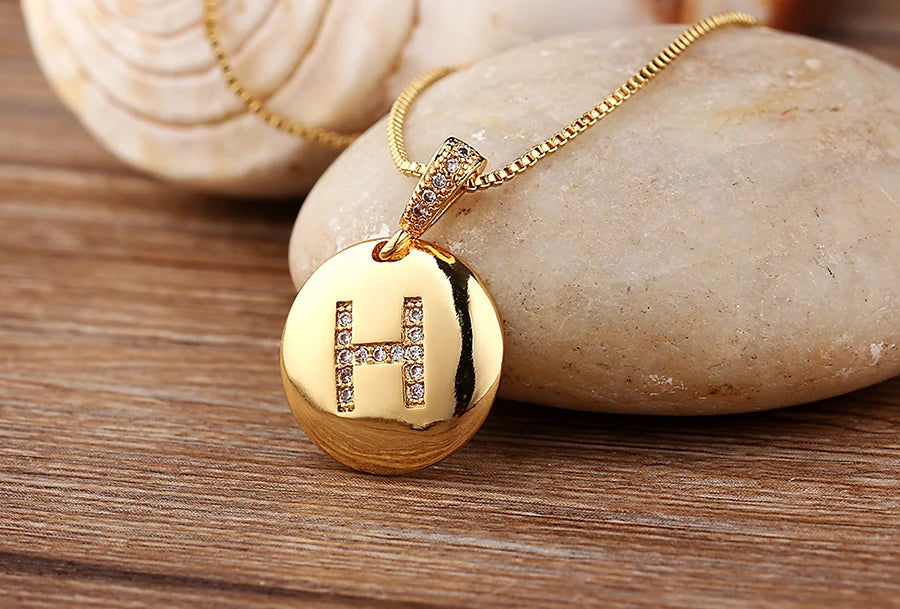Nidin initial letter necklace for women featuring copper and CZ charm with A-Z alphabet pendant, jewelry by 𝕄𝕔 𝕋𝕙𝕖 𝔹𝕝𝕒𝕔𝕜 𝔻𝕚