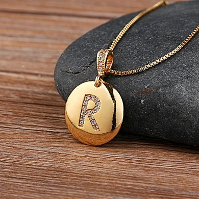 Nidin initial letter necklace for women and girls, copper pendant with CZ stones, featuring the letter A, from 𝕄𝕔 𝕋𝕙𝕖 𝔹𝕝𝕒𝕔𝕜 𝔻�