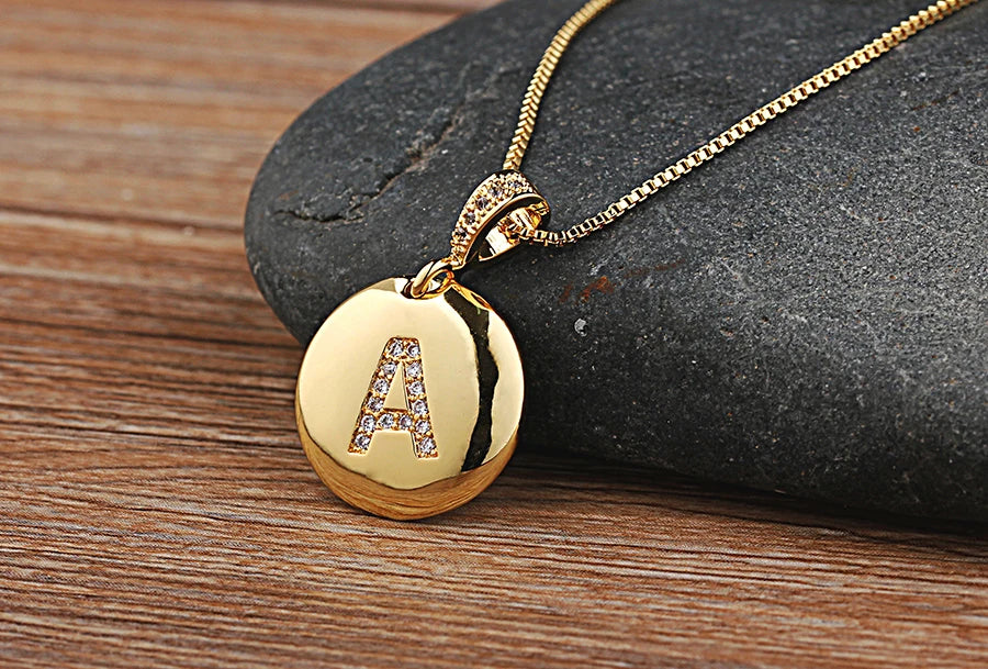 Copper initial letter necklace with CZ charm, featuring the letter A-Z, from 𝕄𝕔 𝕋𝕙𝕖 𝔹𝕝𝕒𝕔𝕜 𝔻𝕚𝕒�