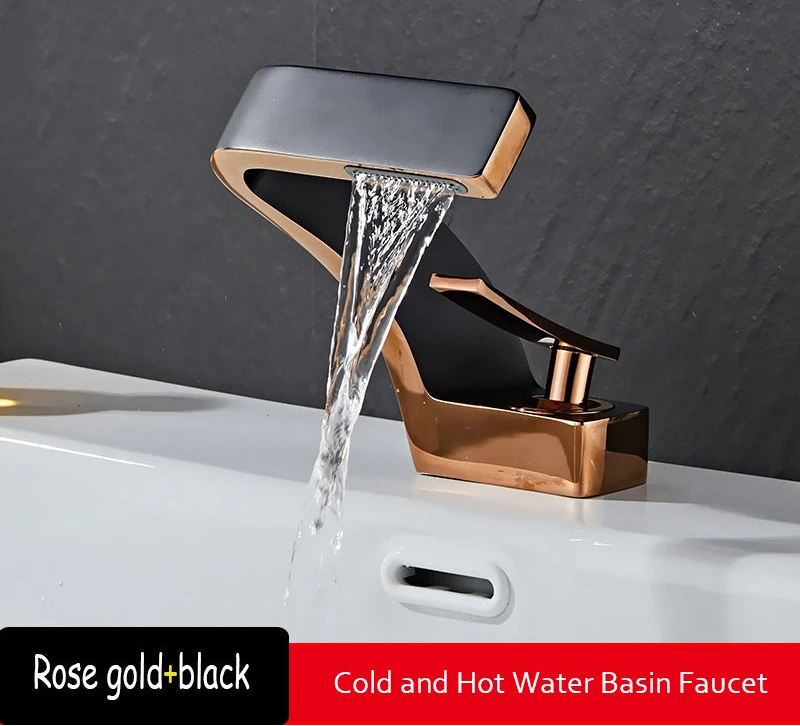 Black and gold brass bathroom sink faucet from 𝕄𝕔 𝕋𝕙𝕖 𝔹𝕝𝕒𝕔𝕜 𝔻𝕚𝕒𝕞𝕠𝕟