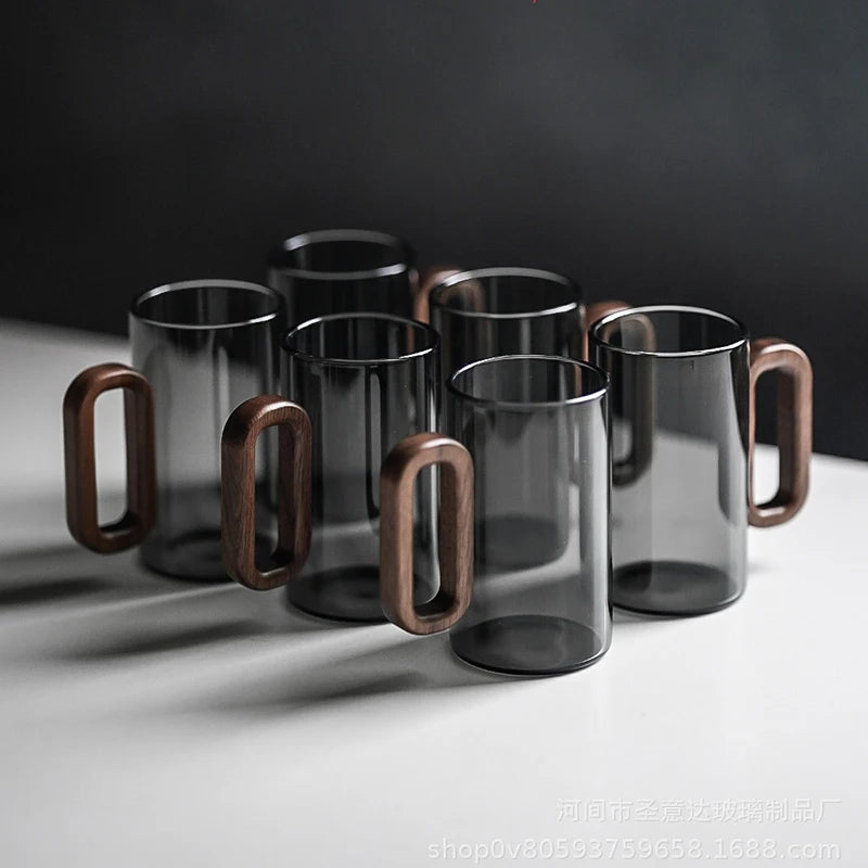 Glass mug with wooden handle from 𝕄𝕔 𝕋𝕙𝕖 𝔹𝕝𝕒𝕔𝕜 𝔻𝕚𝕒𝕞𝕠𝕟�