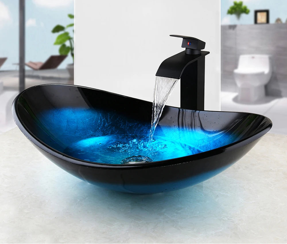 MC THE BLACK DIAMOND ZAPPO tempered glass bathroom vessel sink with blue basin and waterfall black faucet tap, above counter oval design