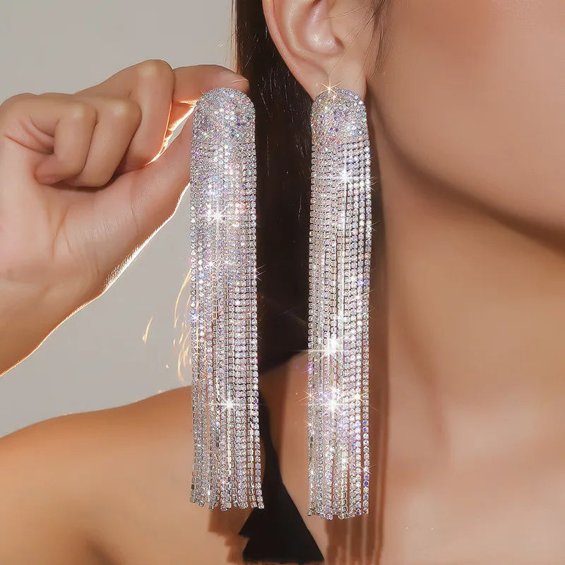 MC THE BLACK DIAMOND long tassel rhinestone drop earrings with crystal dangles for women, fashion jewelry accessory.