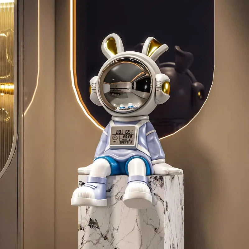 Luxury astronaut rabbit figurine by MC THE BLACK DIAMOND, sitting decor piece for living room or desk decoration.