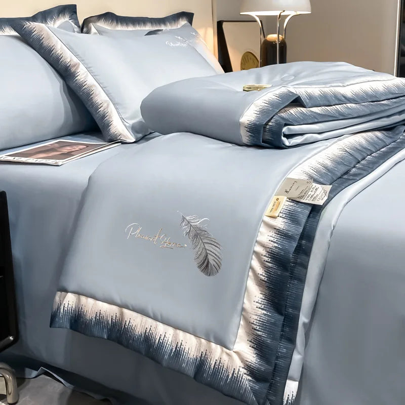 Feather embroidered summer blanket from MC The Black Diamonds, lightweight, stylish duvet perfect for air-conditioned rooms.