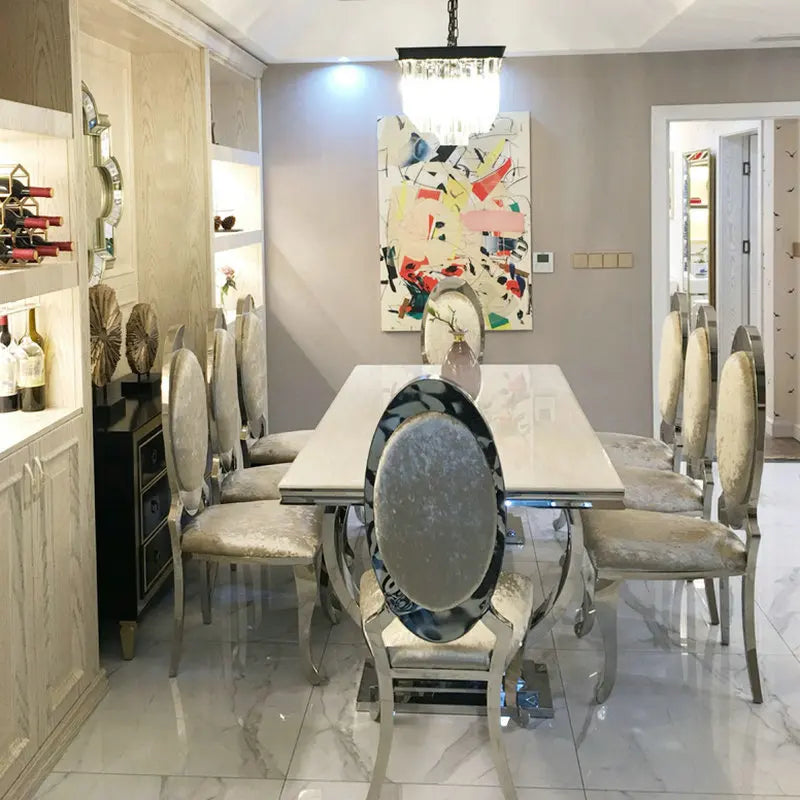 Royal Nordic Light luxury dining table with marble top, silver stainless steel legs, seats 4 to 8, modern home decor by ๐๐ ๐๐๐ ๐น๐๐๐๐