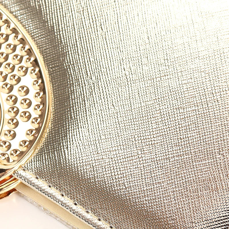Elegant women's evening clutch bag with sparkling rhinestones and chain, perfect for weddings and parties.