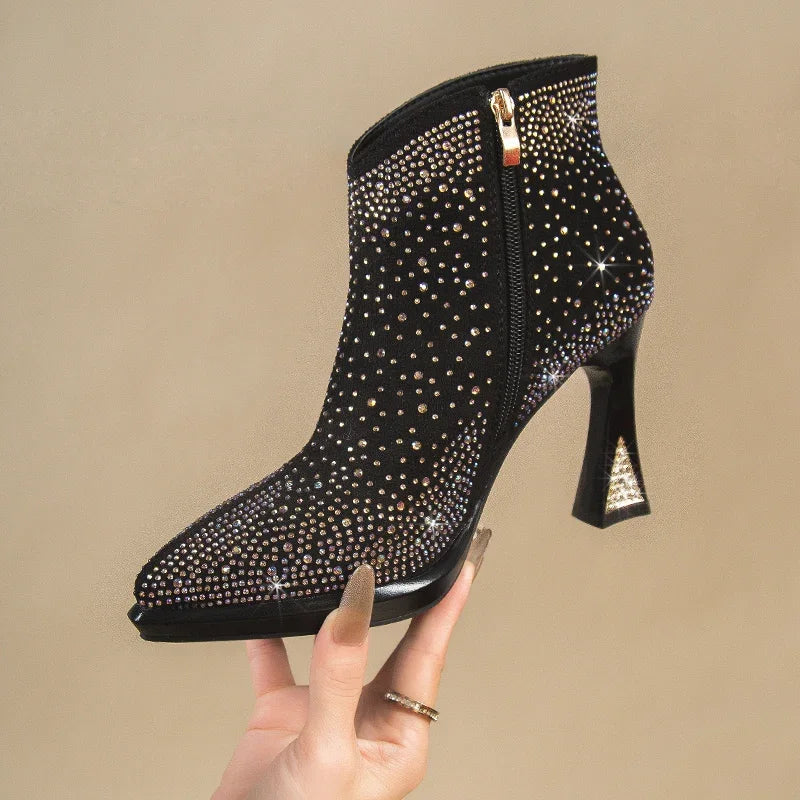 Women's short boots with thick square high heels from Mohammad Collection, featuring black leather and stylish design.