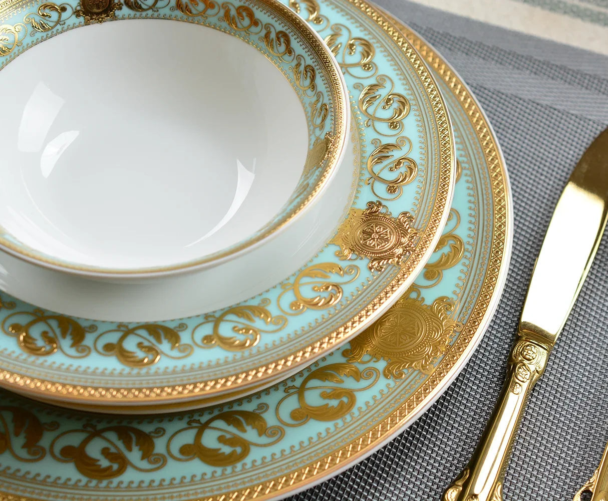 Elegant MC THE BLACK DIAMOND embossed gold porcelain dinnerware set featuring luxury bone china with intricate patterns and a polished finish.