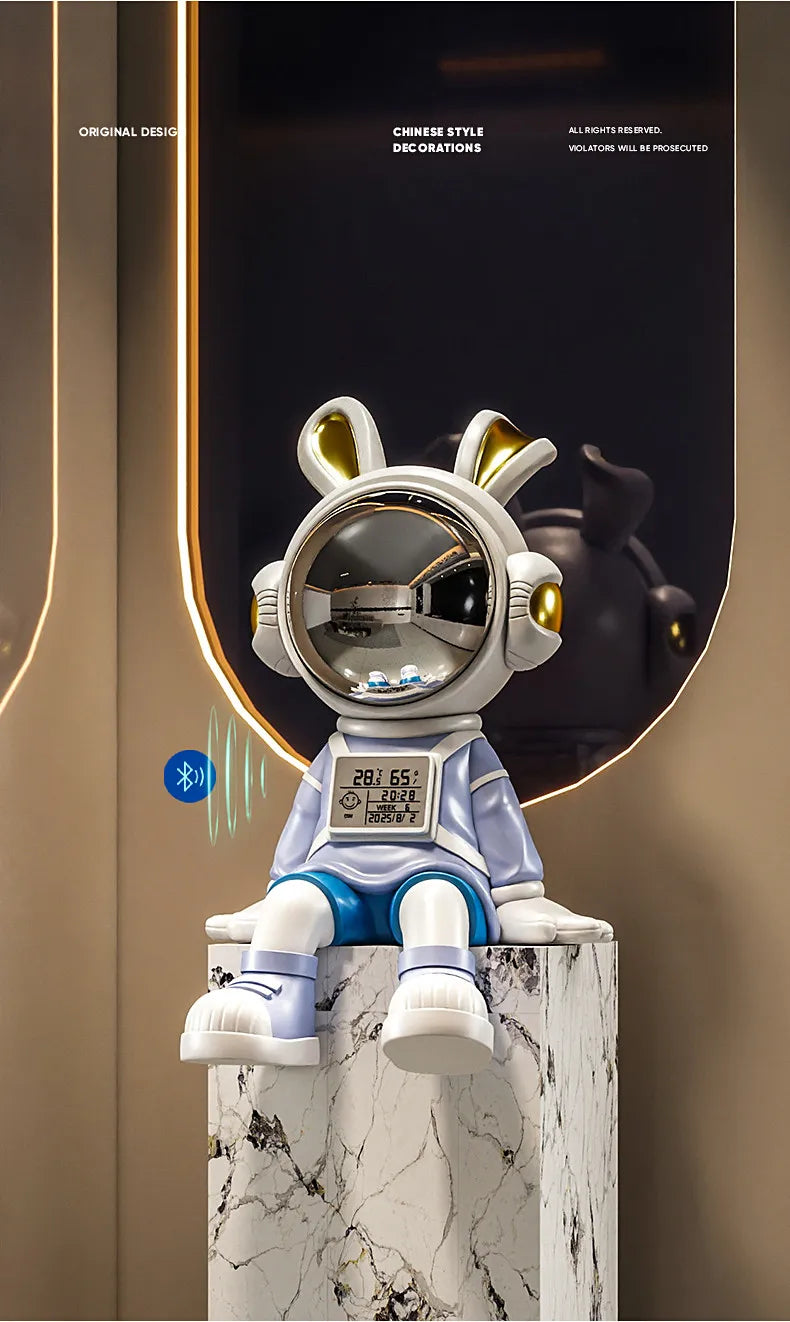 Luxury MC THE BLACK DIAMOND astronaut rabbit figurine sitting on a desk, decorative sculpture for living room decor.