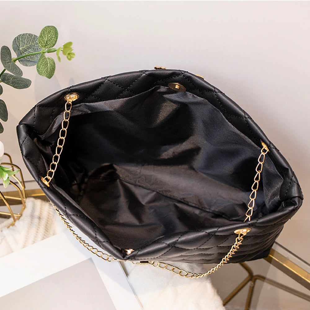 Women's shoulder bag by 𝕄𝕮 𝕋𝕙𝕖 𝔹𝕝𝕒𝕔𝕜 𝔻𝕚𝕒𝕞𝕠𝕟𝕕�