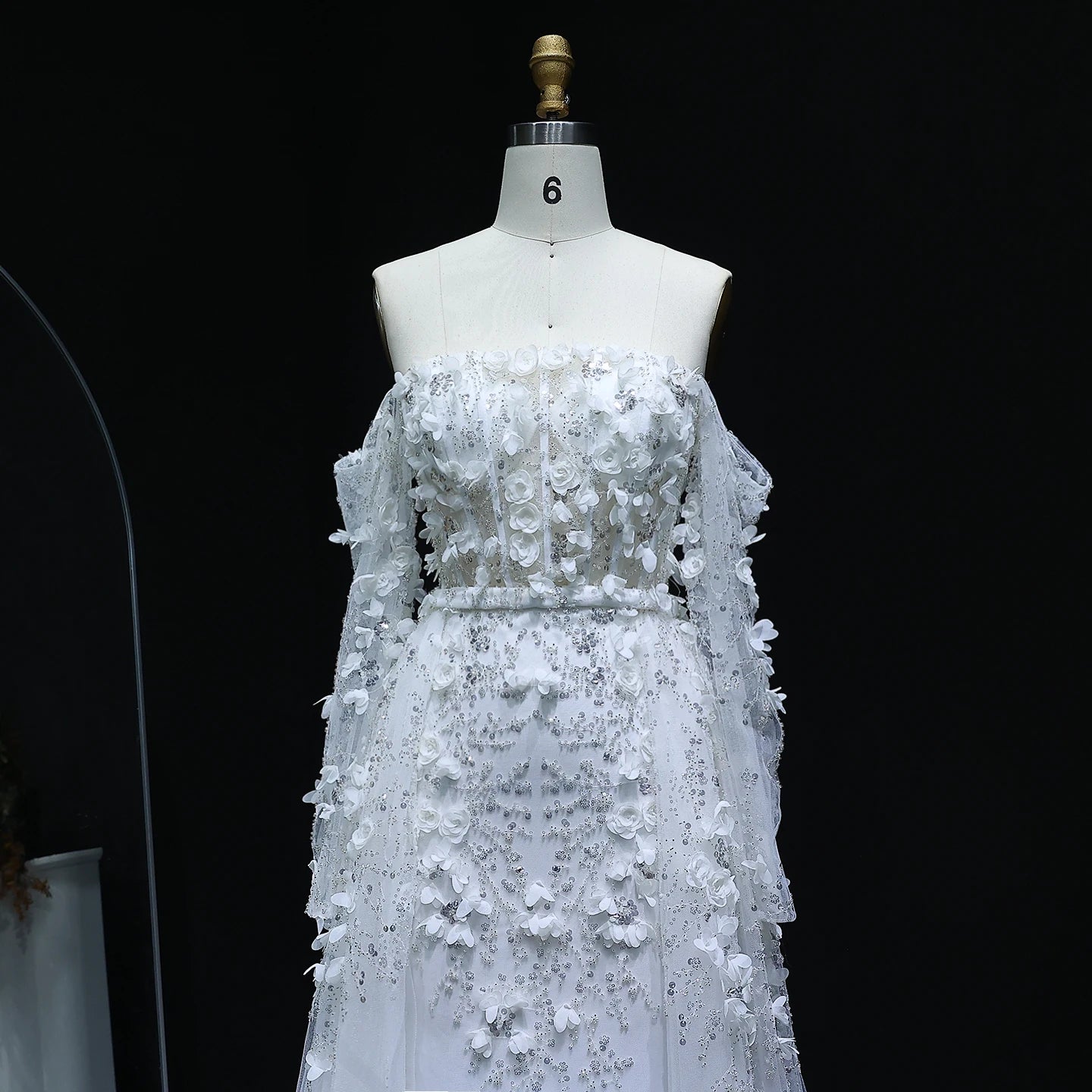 Elegant MC THE BLACK DIAMOND MC Elegant 3D Flowers Dubai evening dress with intricate floral details and a sophisticated silhouette.