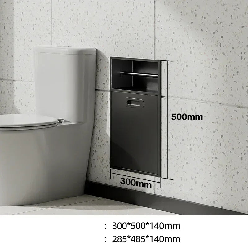 Stainless steel niche bathroom trash can and tissue storage rack with embedded metal design, mounted beside toilet.