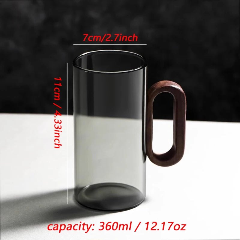 Glass mug with wooden handle from 𝕄𝕔 𝕋𝕙𝕖 𝔹𝕝𝕒𝕔𝕜 𝔻𝕚𝕒𝕞𝕠𝕟�