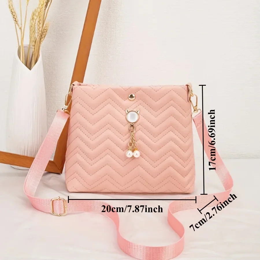 MC THE BLACK DIAMOND women's quilted crossbody bag with cat pearl pendant, elegant shoulder purse for stylish holiday gifting.
