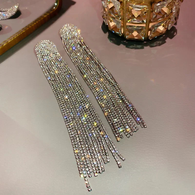 MC THE BLACK DIAMOND long tassel rhinestone earrings for women featuring crystal drop design and fashionable dangle jewelry accessories