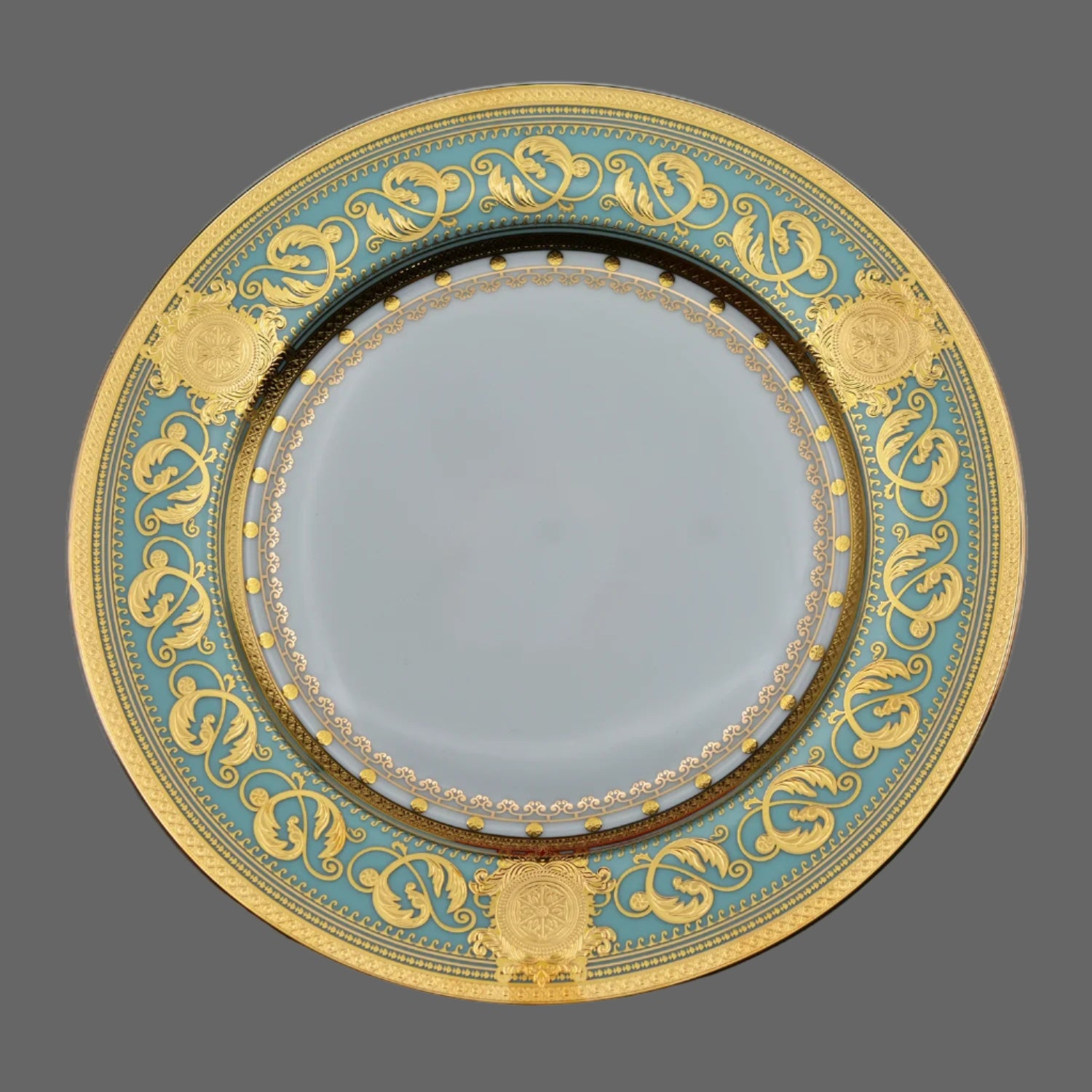 Elegant MC THE BLACK DIAMOND embossed gold porcelain dinnerware set featuring luxury bone china with intricate patterns.