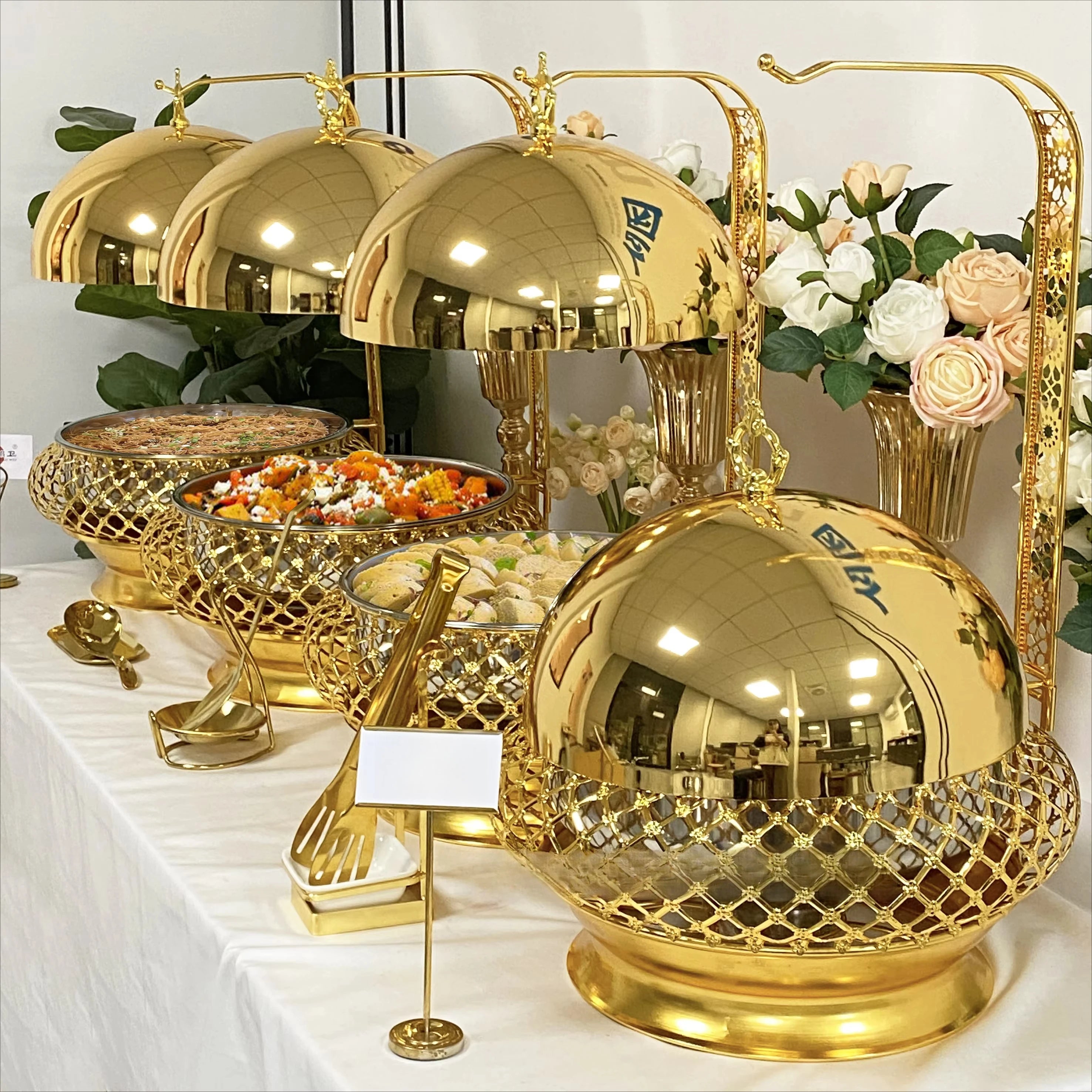 Stainless steel hanging hot pot chafing dish from MC THE BLACK DIAMOND, ideal for wedding party buffet catering displays.