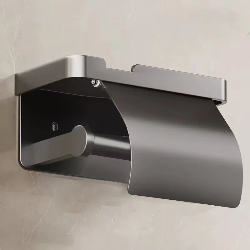 Wall-mounted MC THE BLACK DIAMOND toilet paper holder with waterproof tissue box and storage rack for bathroom organization.