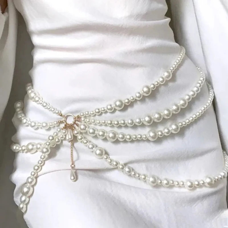 Multilayer pearl waist chain for women with metal rings and tassels, elegant body jewelry by 𝕄𝕔 𝕋𝕙𝕖 𝔹𝕝𝕒𝕔𝕜 𝔻𝕚�