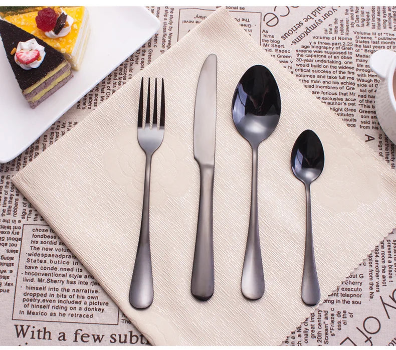 24-piece stainless steel cutlery set with knives, forks, and spoons from 𝕄𝕔 𝕋𝕙𝕖 𝔹𝕝𝕒𝕔𝕜 𝔻𝕚𝕒�