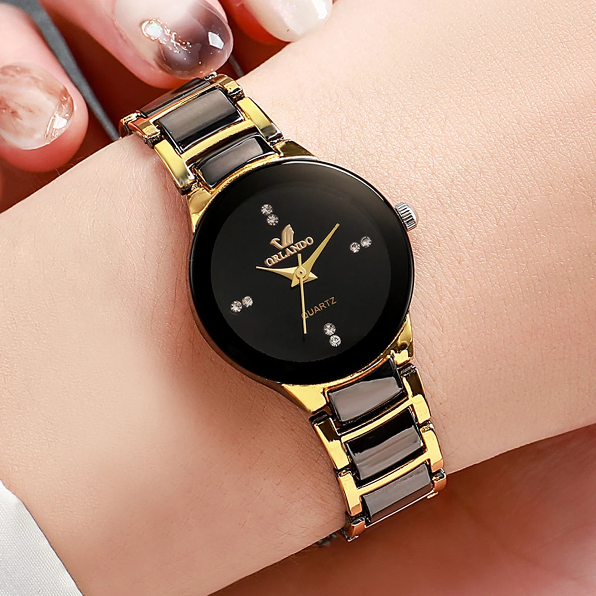 Matching couple's watches by MC The Black Diamonds, black watch faces with silver details, sleek and stylish for him and her.