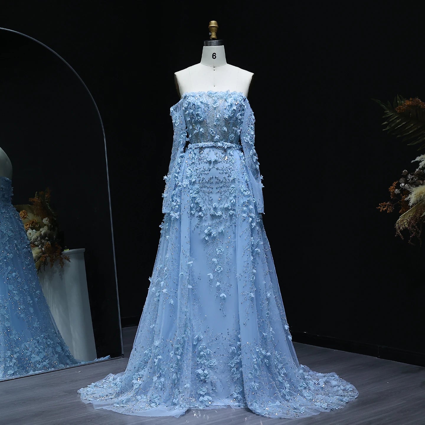 Elegant MC THE BLACK DIAMOND MC Elegant 3D Flowers Dubai evening dress with intricate floral details and sophisticated design.