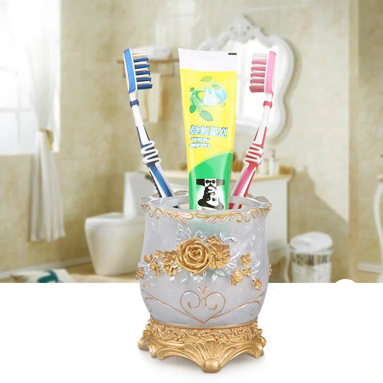 European Resin bathroom set including soap dispenser, toothbrush holder, cup, soap dish, toilet brush, and wastebin by MC THE BLACK DIAMOND