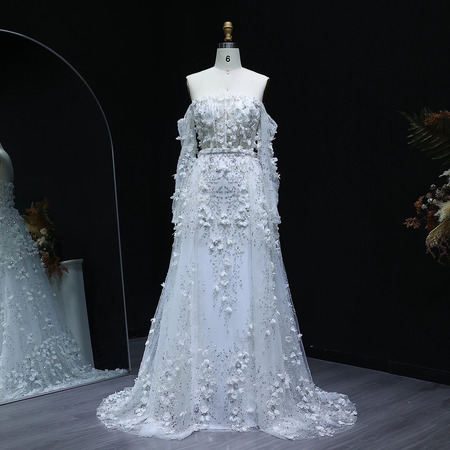 Elegant MC THE BLACK DIAMOND MC Elegant 3D Flowers Dubai evening dress with intricate floral details and a sophisticated silhouette.