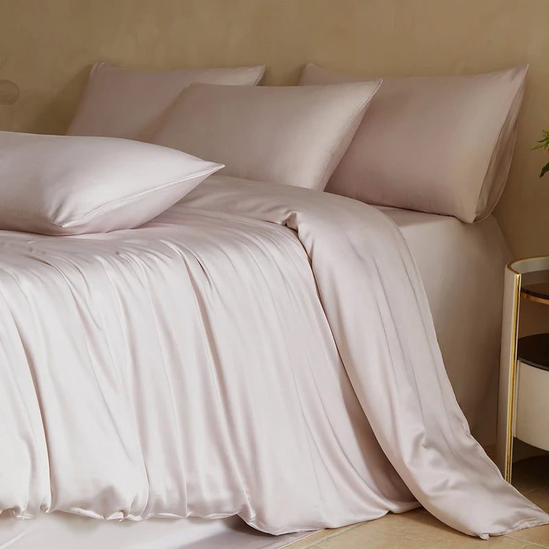MC Collection 100% Mulberry Silk Bedding Set with smooth silk sheets and pillowcases, showcasing luxurious home decor in a cozy bedroom setting.