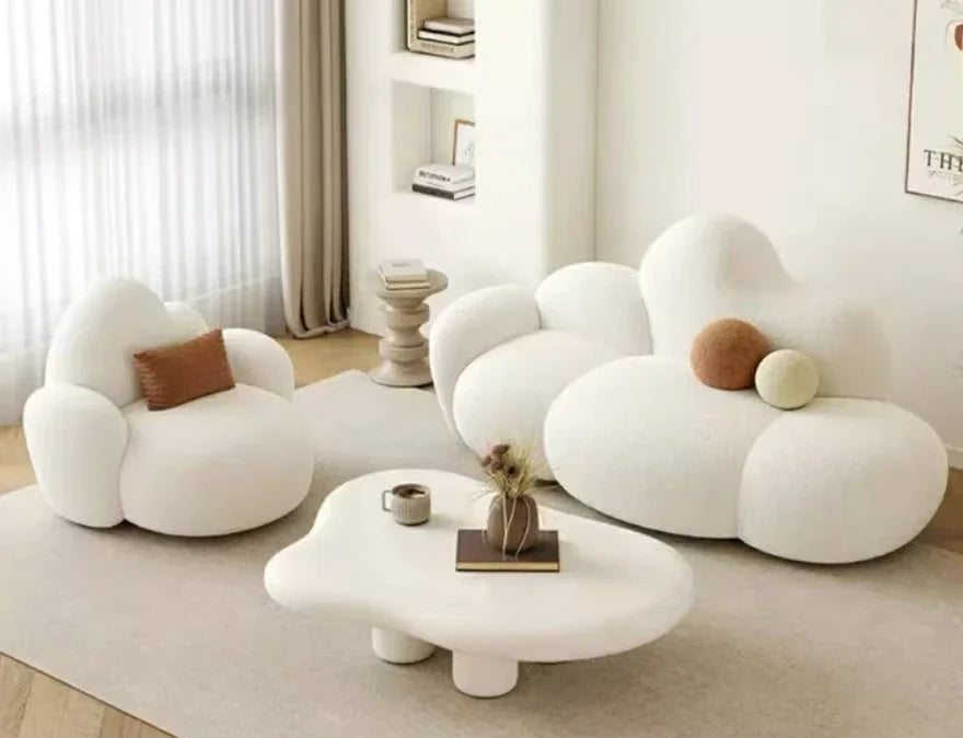 White MC THE BLACK DIAMOND sofa in a living room setting, showcasing a comfortable, relaxing lounge sofa with soft cushions.