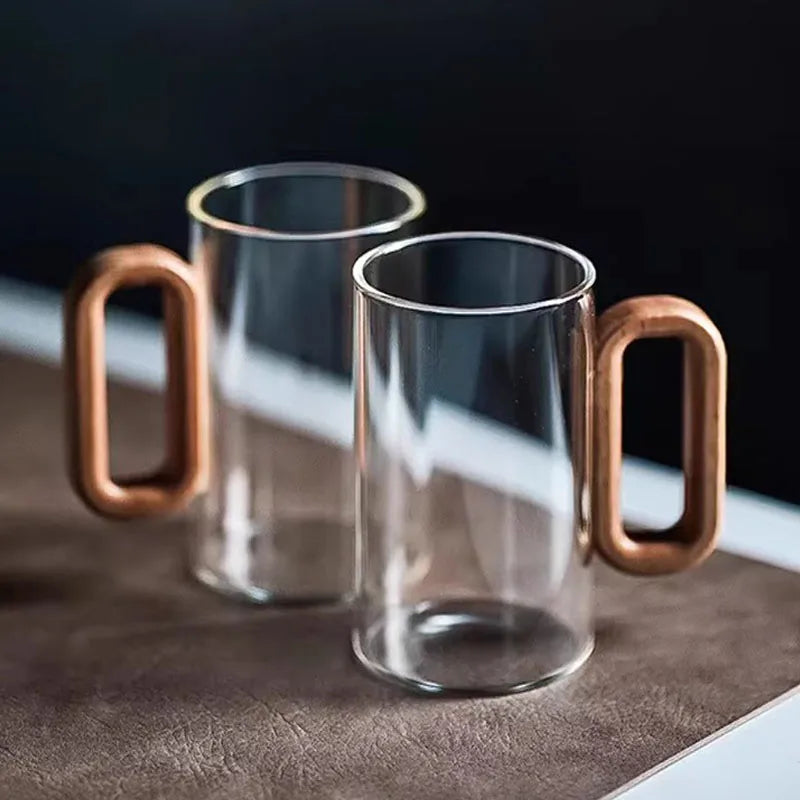Glass mug with wooden handle from 𝕄𝕔 𝕋𝕙𝕖 𝔹𝕝𝕒𝕔𝕜 𝔻𝕚𝕒𝕞𝕠𝕟�