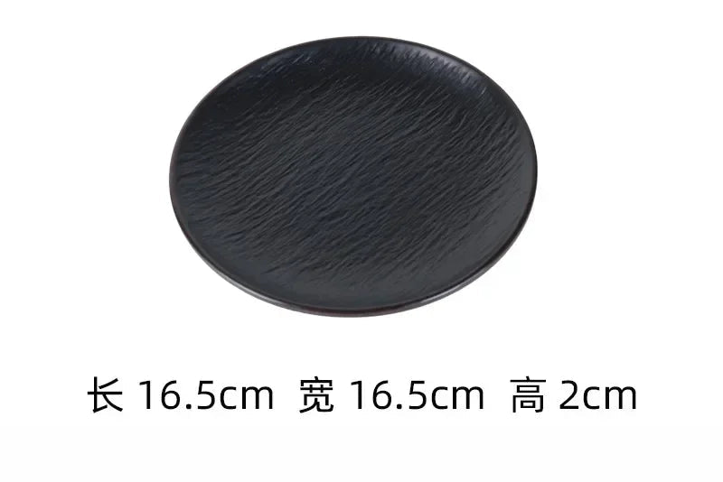 Black frosted melamine dinner plate from Mc The Black Diamonds, ideal for sushi, snacks, and fruit in hotpot restaurant kitchen.
