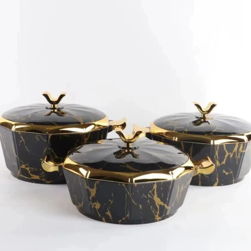 Set of three MC The Black Diamonds food warmers and casserole thermal containers in various sizes, with insulated lunch boxes for hotpot.