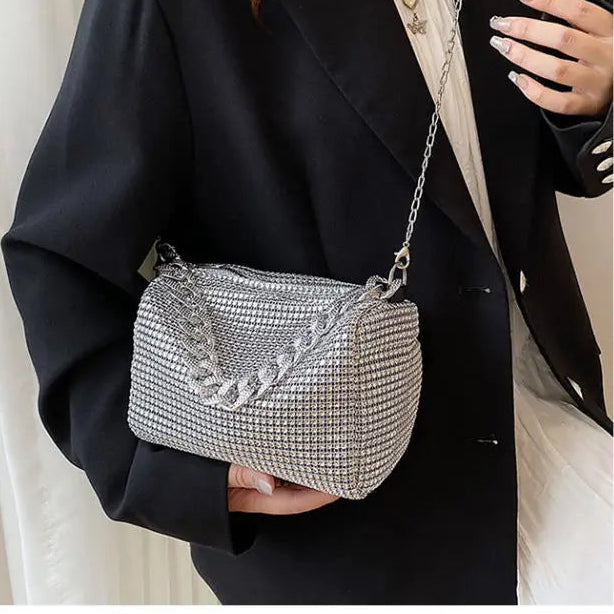 Bright diamond-patterned MC THE BLACK DIAMOND handbag, stylish messenger fashion tote with bold design and shiny accents.