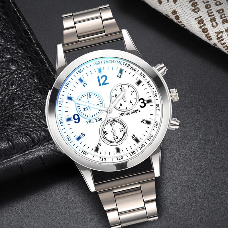 Matching couple's watches by MC The Black Diamonds, featuring black bands and elegant round watch faces for him and her.