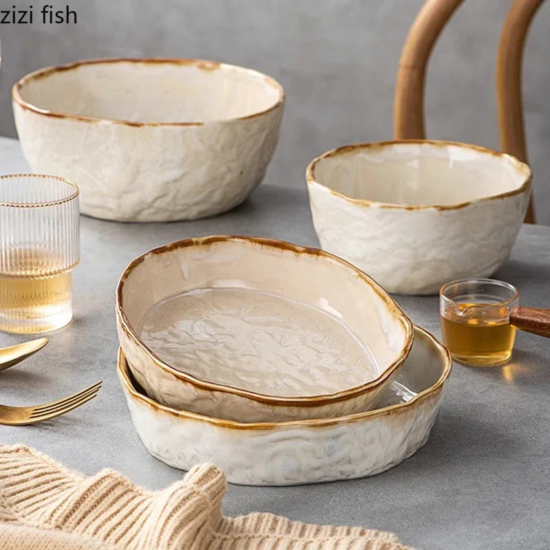 Set of ceramic deep thick dinnerware from MC THE BLACK DIAMOND, including plates and bowls arranged on a table.
