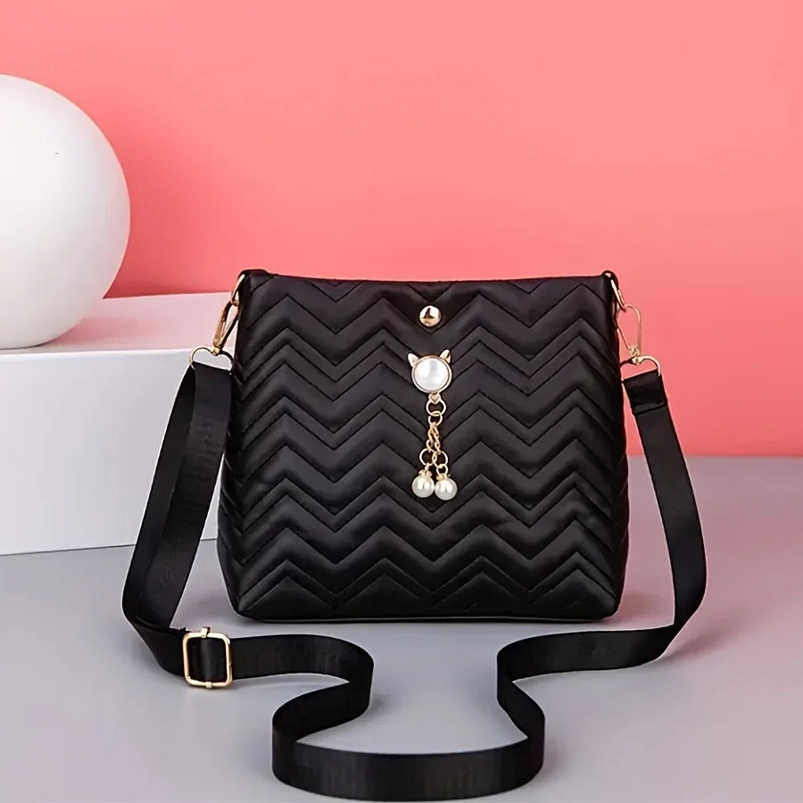 MC THE BLACK DIAMOND women's quilted crossbody bag with cat pearl pendant, stylish shoulder handbag for holiday gifts.