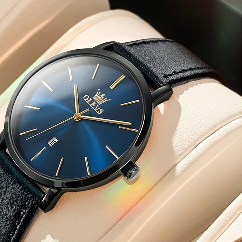 Classic minimalist OLEVS ladies' wristwatch with leather strap, waterproof quartz movement, calendar, and versatile genuine leather design.