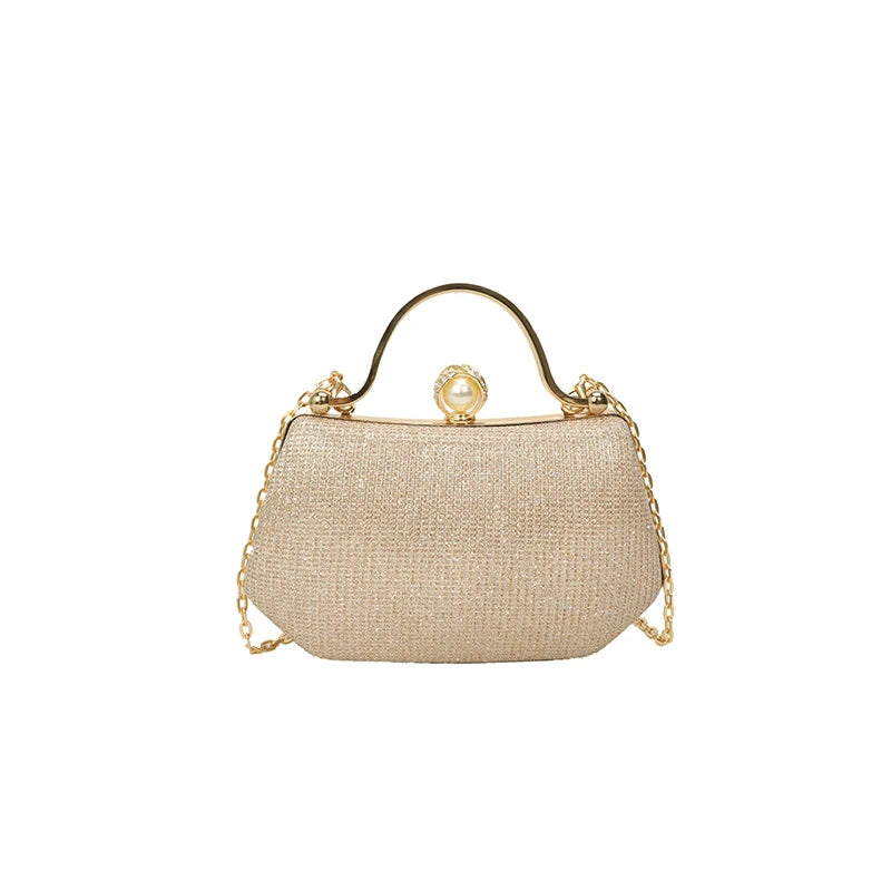 Black solid color MC The Black Diamonds womenโs hand bag with chain strap and simple crossbody design.