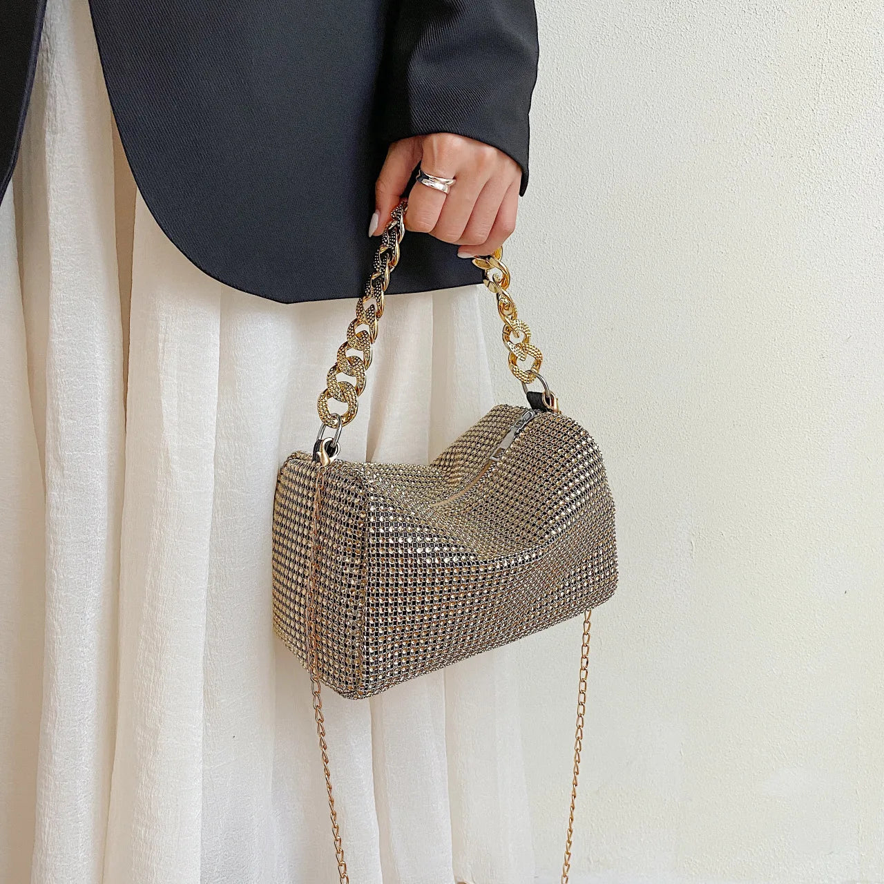 Bright diamond-patterned black MC THE BLACK DIAMOND handbag with a sleek messenger style and fashionable design.