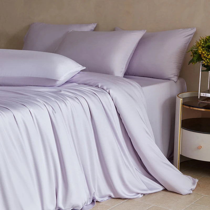 Luxurious MC Collection 100% Mulberry Silk Bedding Set with smooth silk sheets and pillowcases, showcasing elegant home decor.