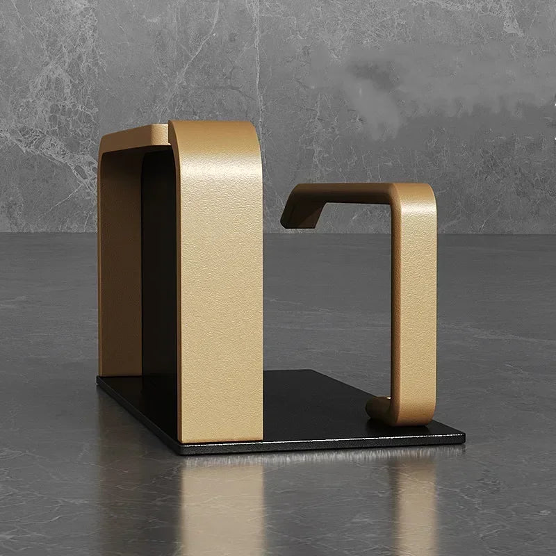 Black gold toilet paper holder from MC THE BLACK DIAMOND, sleek bathroom accessory with modern design and wall mount.