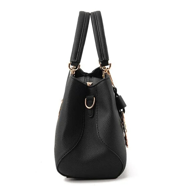 Women messenger bag with flower pendant from 𝕄𝕔 𝕋𝕙𝕖 𝔹𝕝𝕒𝕔𝕜 𝔻𝕚𝕒𝕞𝕠𝕟�