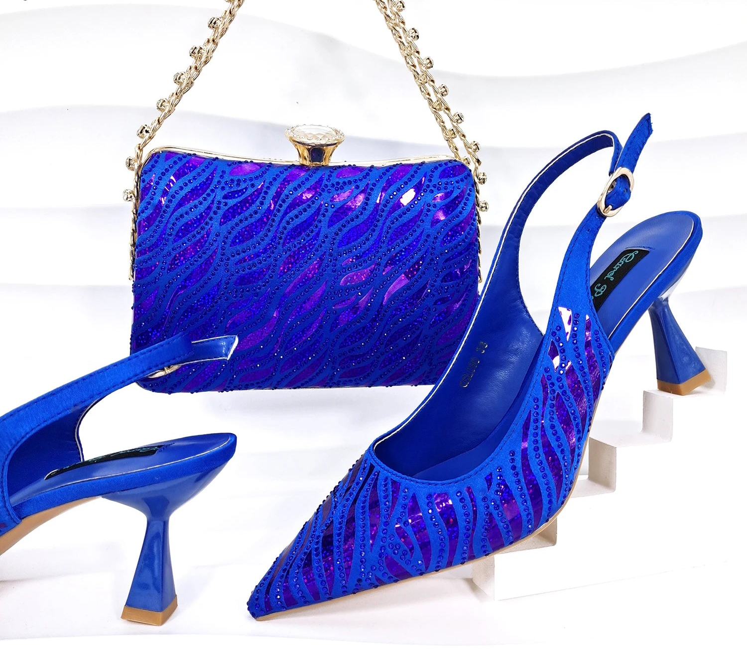 MC THE BLACK DIAMOND Nigerian style women heels with pointed toes and shiny clutch for party occasions.