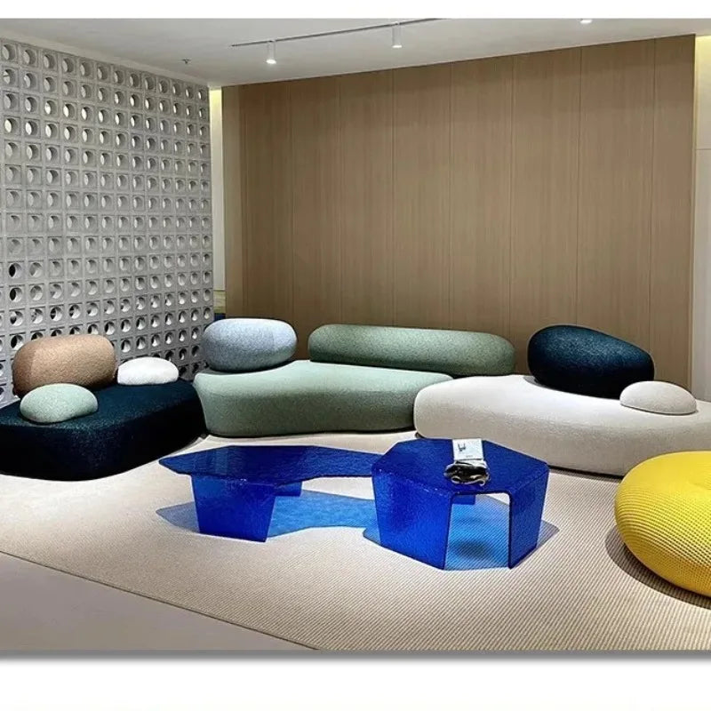 Luxury MC THE BLACK DIAMOND sofa in pebble fabric with a unique shape, plush sponge cushions, ideal for modern living rooms.