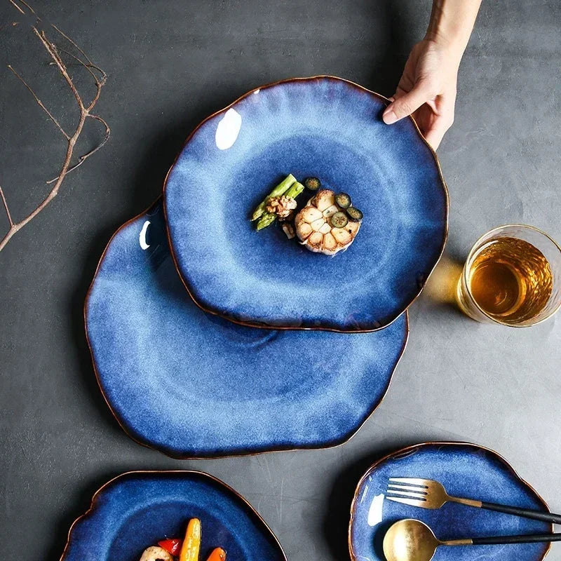 Deep blue ceramic flat plate with irregular edges from 𝕄𝕔 𝕥𝕙𝕖 𝔹𝕝𝕒𝕔𝕜 𝔻𝕚𝕒𝕞𝕠�