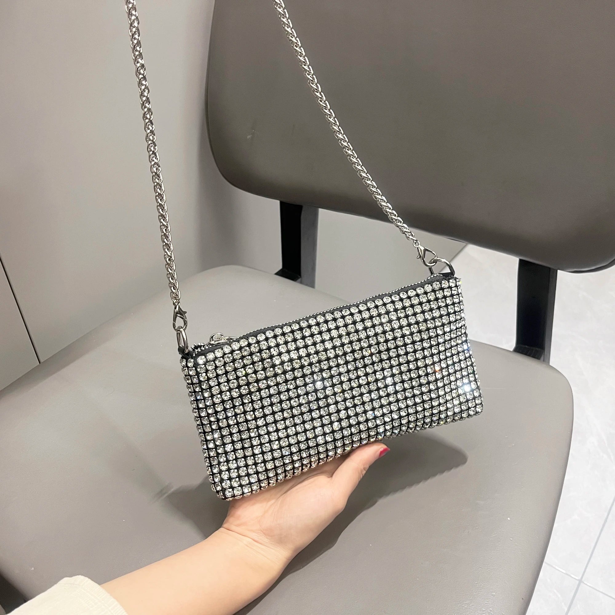 Luxury MC THE BLACK DIAMOND rhinestone clutch purse with elegant handle and shoulder strap for women, stylish evening handbag.